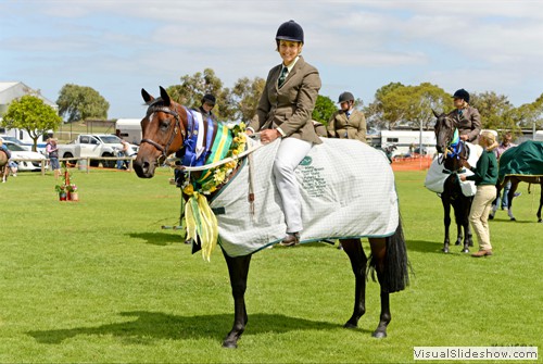 Proud exhibitor Lindy Launer on �Koolatoo Beau Elle� at the Presentation for the 6yo & over maturity class